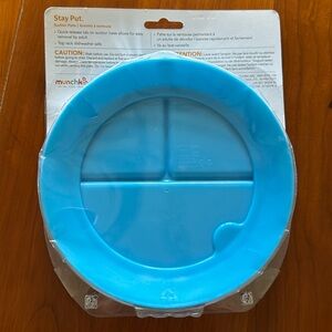Two Munchkin stay put suction plates, blue and green, for price of one.